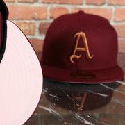 pink under visor on the Philadelphia Athletics Glow In the Dark 1929 World Series Side Patch Pink Bottom Cardinal 5950 Fitted Cap | Pumpkin Wine