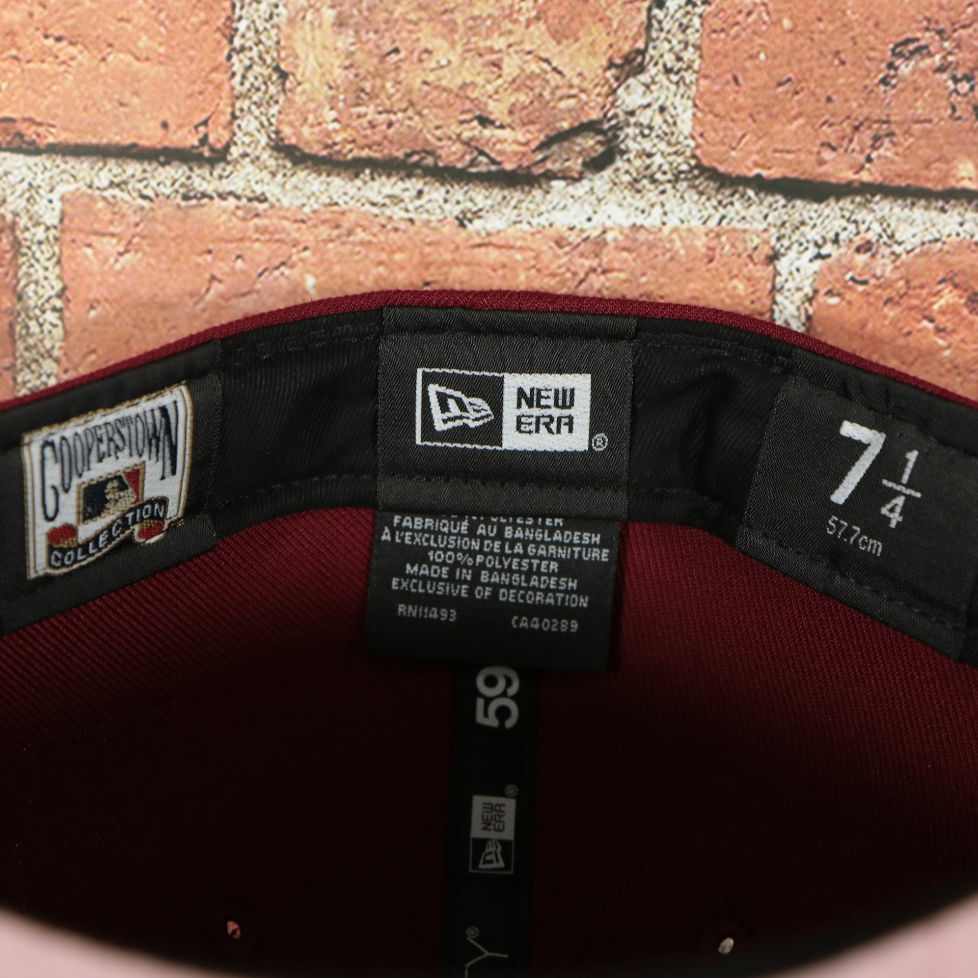 new era label on the Philadelphia Athletics Glow In the Dark 1929 World Series Side Patch Pink Bottom Cardinal 5950 Fitted Cap | Pumpkin Wine