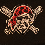 Close up of the Pirates logo on the Pittsburgh Pirates "Patch Pride" All Over Gray Bottom Side Patch 59Fifty Fitted Cap