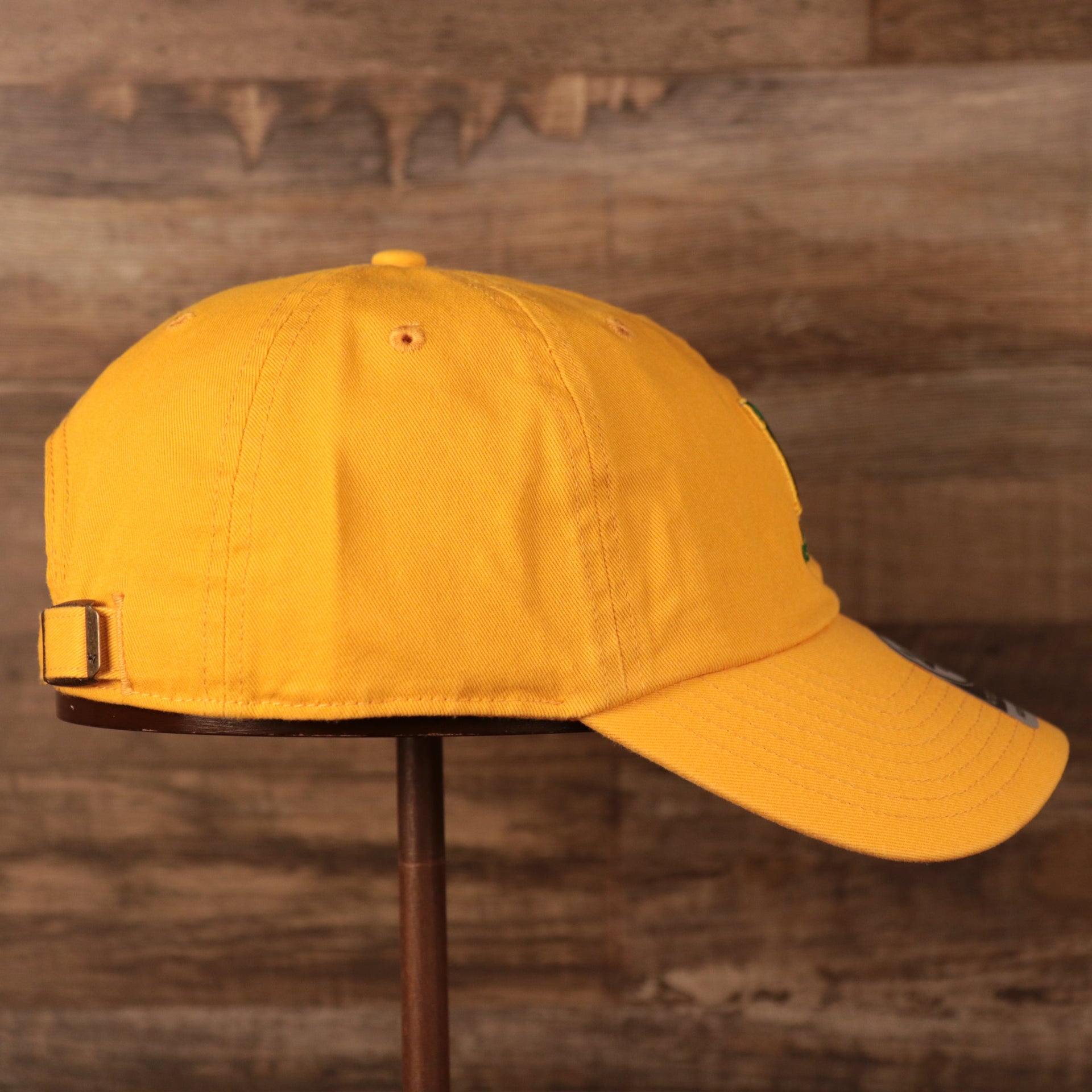 wearers right side of the Minnesota North Stars Yellow Adjustable Retro Dad Hat