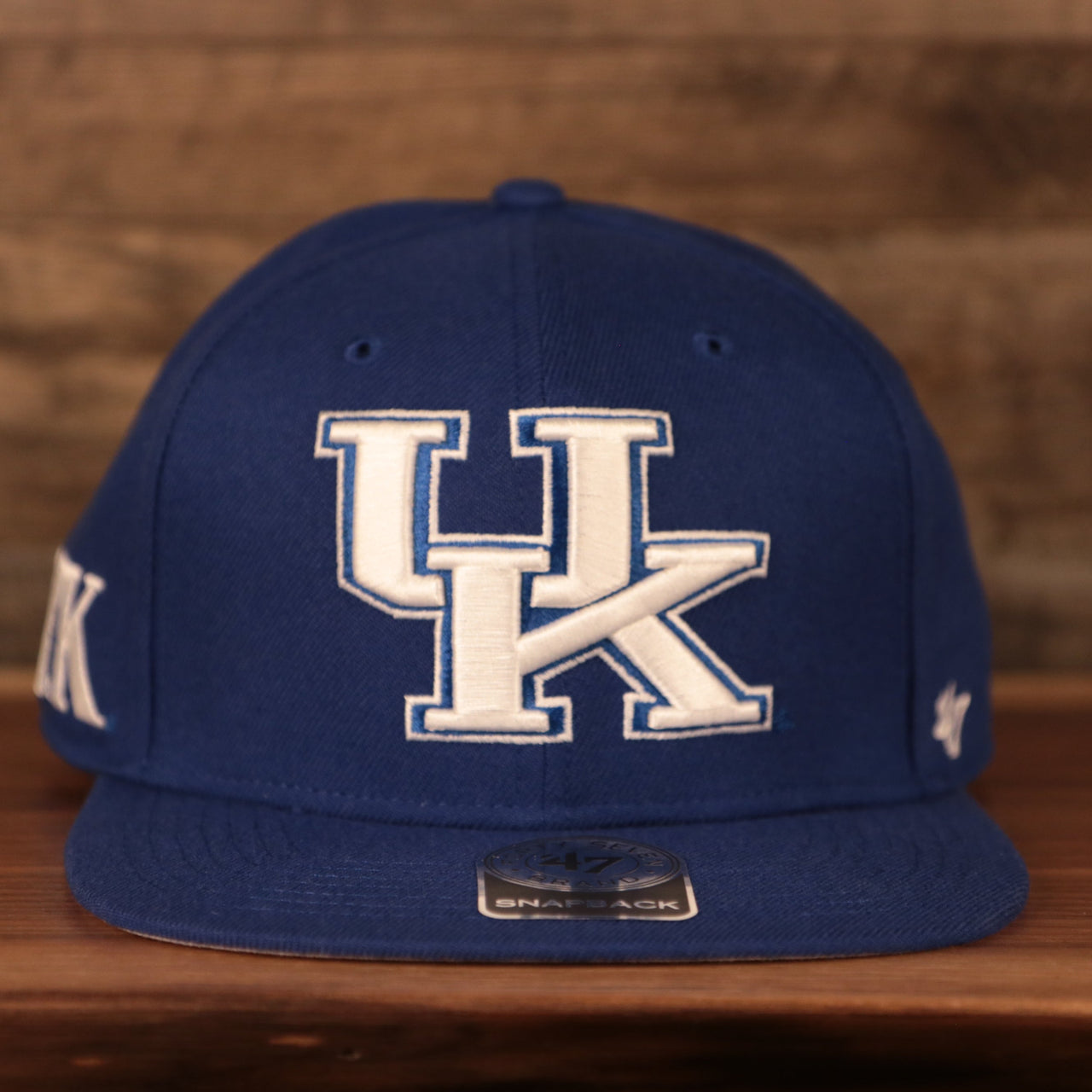 front of the Kentucky Wildcats Royal Blue Adjustable Snapback Hat