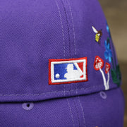 The MLB Batterman Logo on the Cooperstown Arizona Diamondbacks Gray Bottom Bloom Spring Embroidery 59Fifty Fitted Cap | Purple 59Fifty Cap