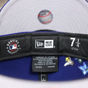 The Tags on the Los Angeles Dodgers Gray Bottom Bloom Spring Embroidery 59Fifty Fitted Cap | Royal Blue 59Fifty Cap