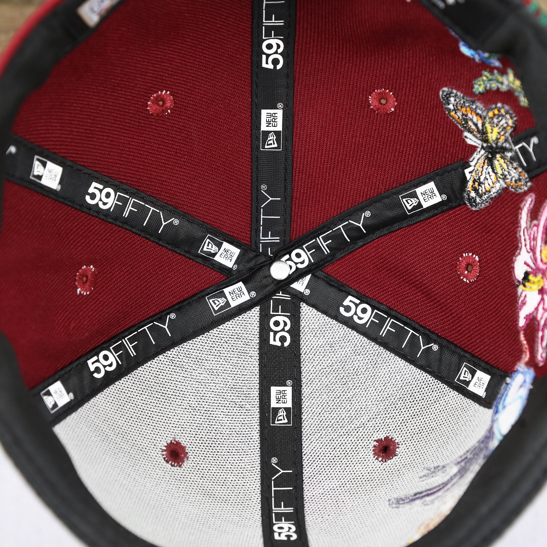 The inside of the Cooperstown Philadelphia Phillies Gray Bottom Bloom Spring Embroidery 59Fifty Fitted Cap | Maroon 59Fifty Cap