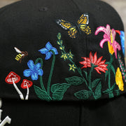 The backside of the bloom patch on the Chicago White Sox Gray Bottom Bloom Spring Embroidery 59Fifty Fitted Cap | Black 59Fifty Cap