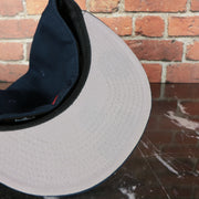 grey under visor on the New England Patriots Tribute Turn Grey Bottom | Navy 59Fifty Fitted Cap