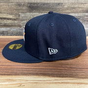 Wearer's left of the Houston Astros "City Cluster" Side Patch Gray Bottom Navy 59Fifty Fitted Cap