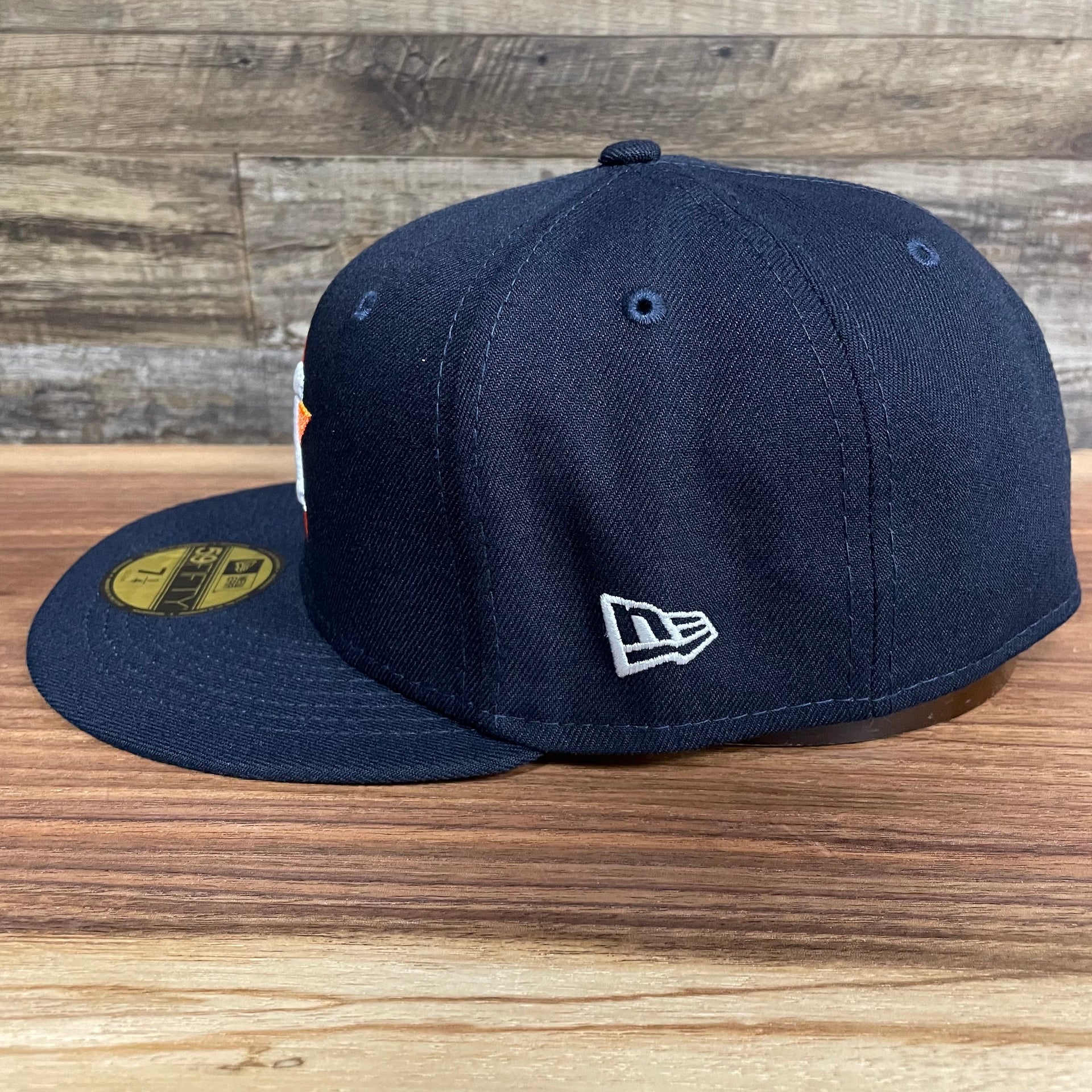 Wearer's left of the Houston Astros "City Cluster" Side Patch Gray Bottom Navy 59Fifty Fitted Cap