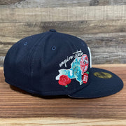 Wearer's right of the New York Yankees "City Cluster" Side Patch Gray Bottom Navy 59Fifty Fitted Cap