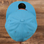 Top down view of the Tune Squad Shield Lebron 18 Space Jam Matching 59Fifty Fitted Cap | Blue