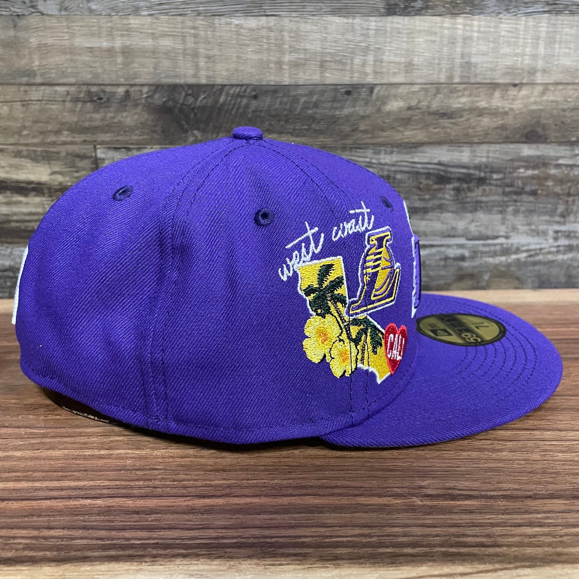 Wearer's right of the Los Angeles Lakers "City Cluster" Side Patch Gray Bottom Purple 59Fifty Fitted Cap