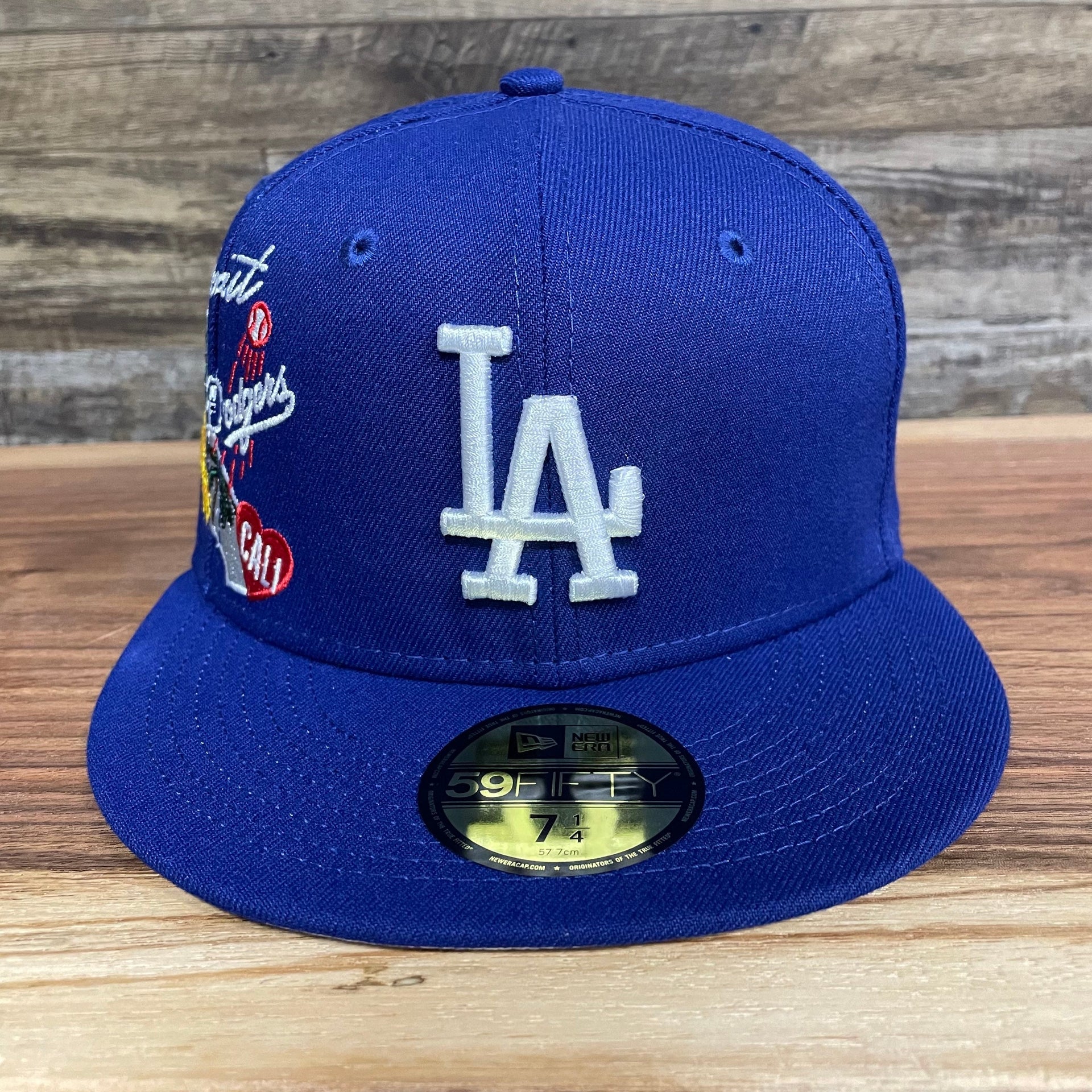 Front of the Los Angeles Dodgers "City Cluster" Side Patch Gray Bottom Royal 59Fifty Fitted Cap