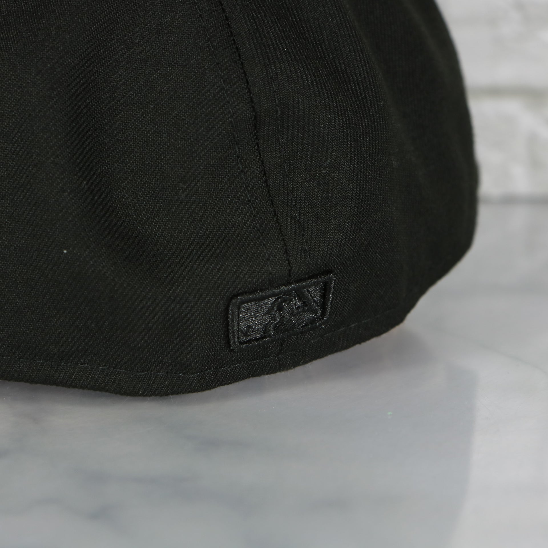 mlb batterman logo on the Philadelphia Phillies All Black Fitted Cap | Phillies New Era Black on Black 59fifty | Grey Underbrim All Black 5950