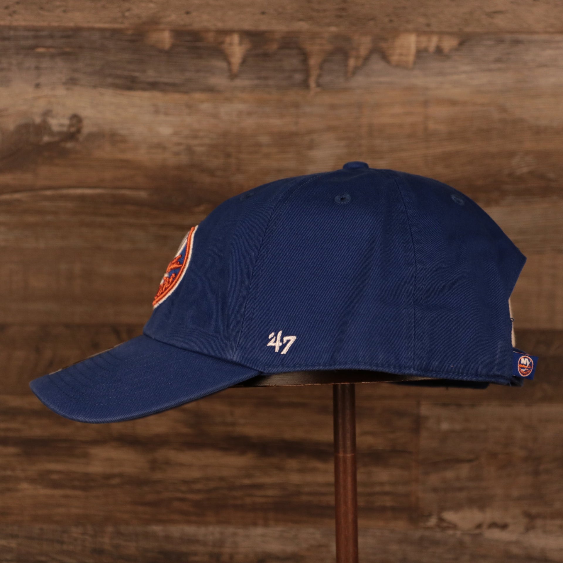 wearers left side of the New York Islanders Royal Blue Adjustable Dad Hat