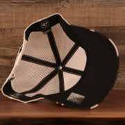 underside of the Boston Bruins Brown, White, and Yellow Retro Adjustable Trucker Dad Hat