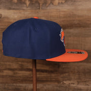 wearers right side of the New York Knicks Royal Blue and Orange Adjustable Grey Bottom Snapback Hat