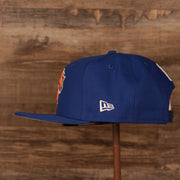 Embroidered on the wearer's left side of the New York Knicks 2021 NBA Playoffs snapback hat is the New Era logo in white