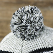 pom of the Kid’s Oakland Raiders Striped Cuffed Winter Beanie With Pom Pom | Kid’s  Black And Gray Winter Beanie