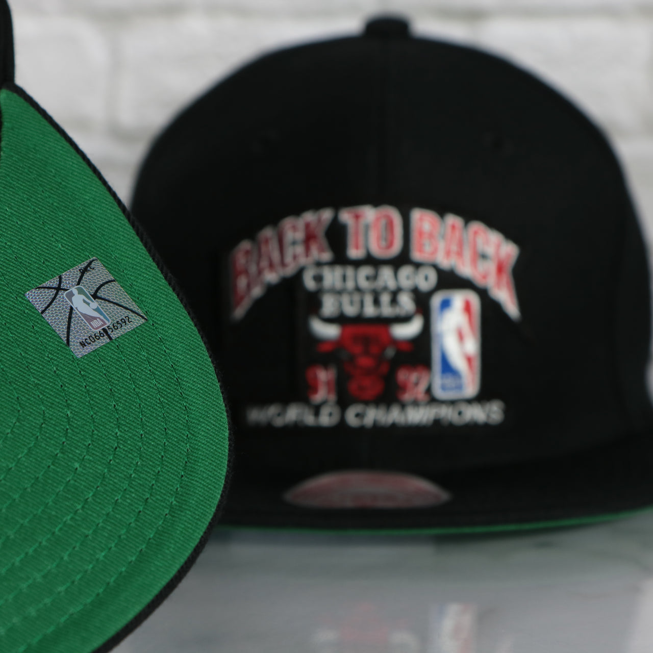 green under visor on the Chicago Bulls Vintage Retro NBA Champions 91-92 Back to Back Mitchell and Ness Snapback Hat | Black