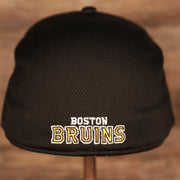 back side of the Boston Bruins Black & Yellow Stretch Fit Dad Hat