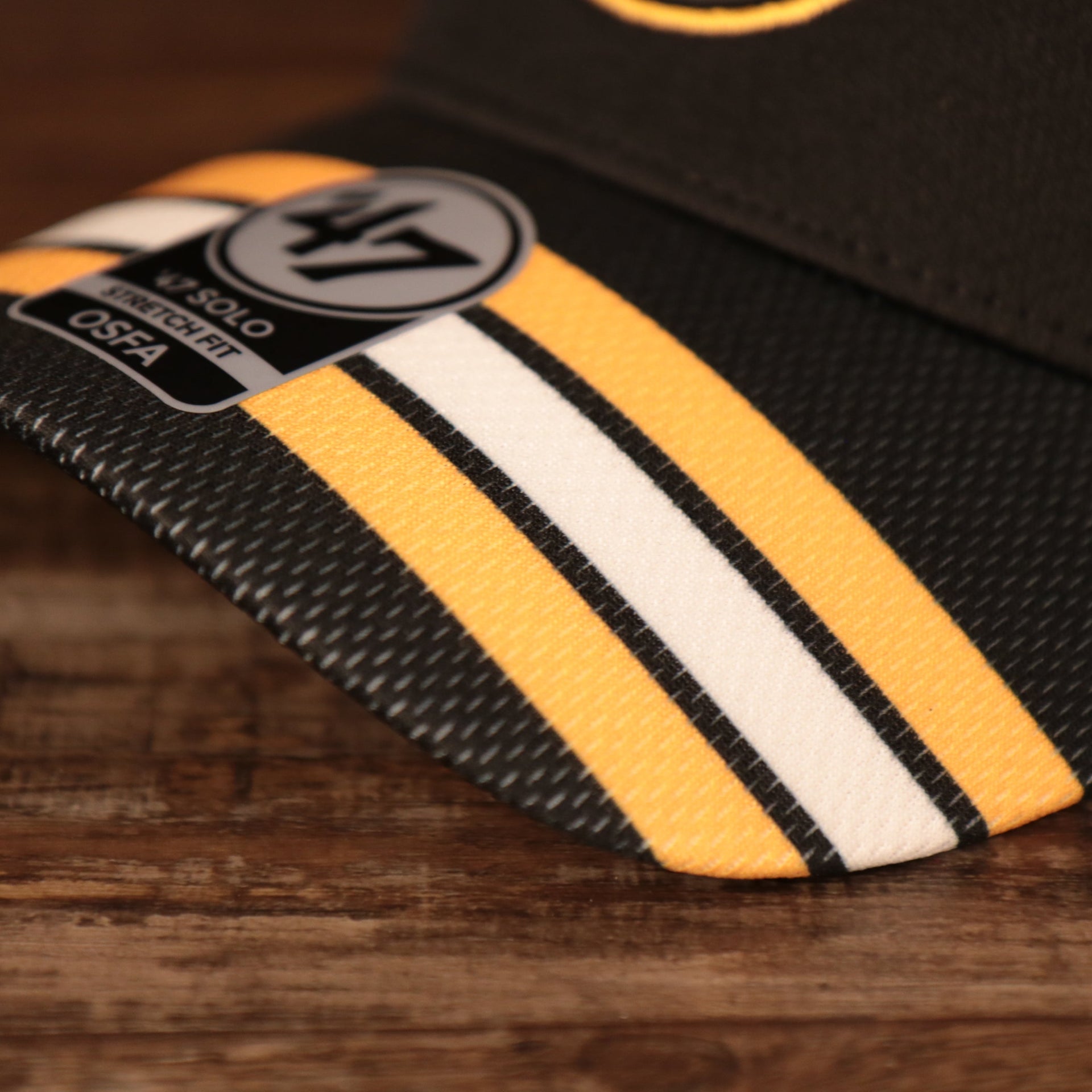brim shot on the Boston Bruins Black & Yellow Stretch Fit Dad Hat