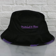 mitchell and ness logo on the Toronto Raptors 90s Inspired NBA Hyper Mitchell and Ness Reversible Bucket Hat