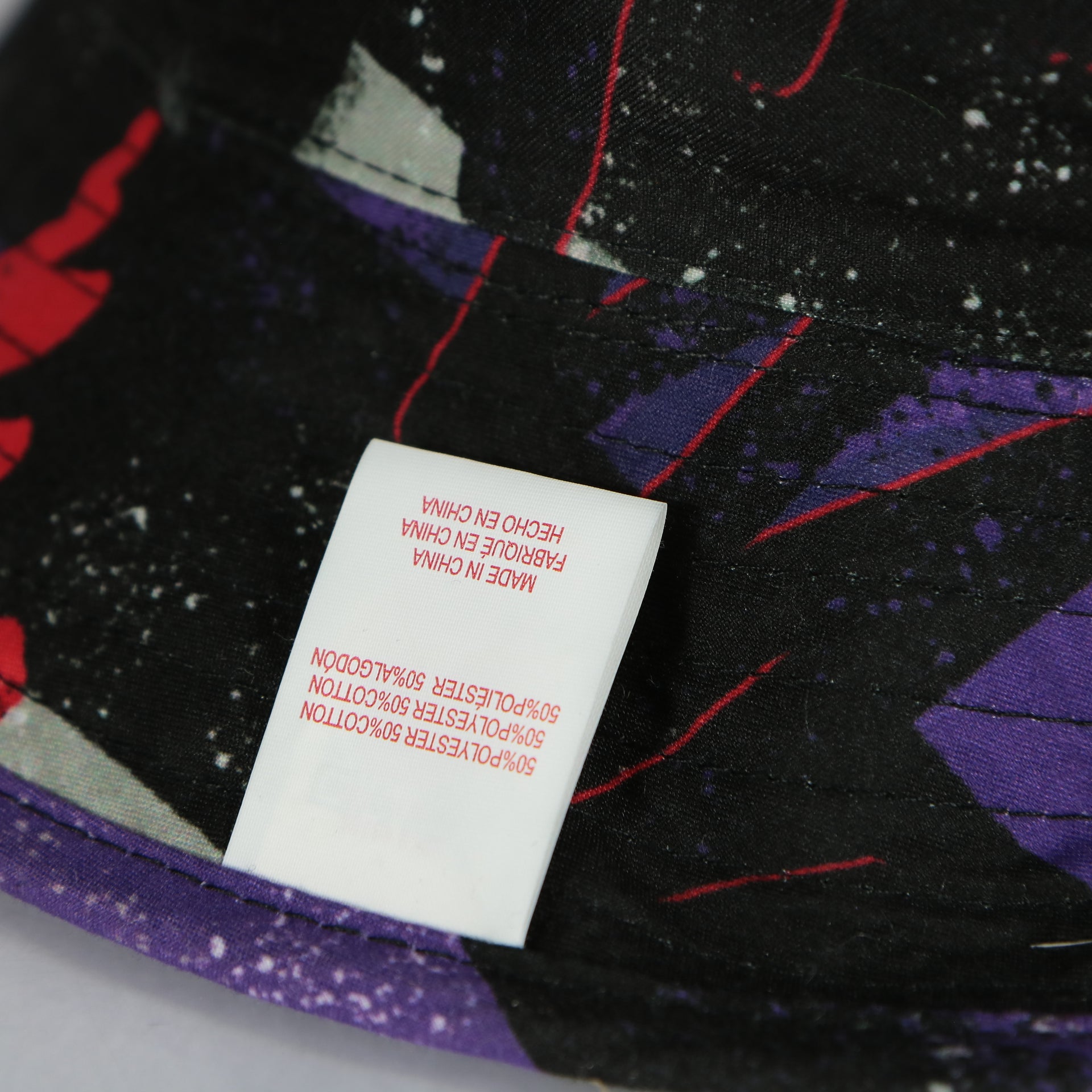 label of the Toronto Raptors 90s Inspired NBA Hyper Mitchell and Ness Reversible Bucket Hat