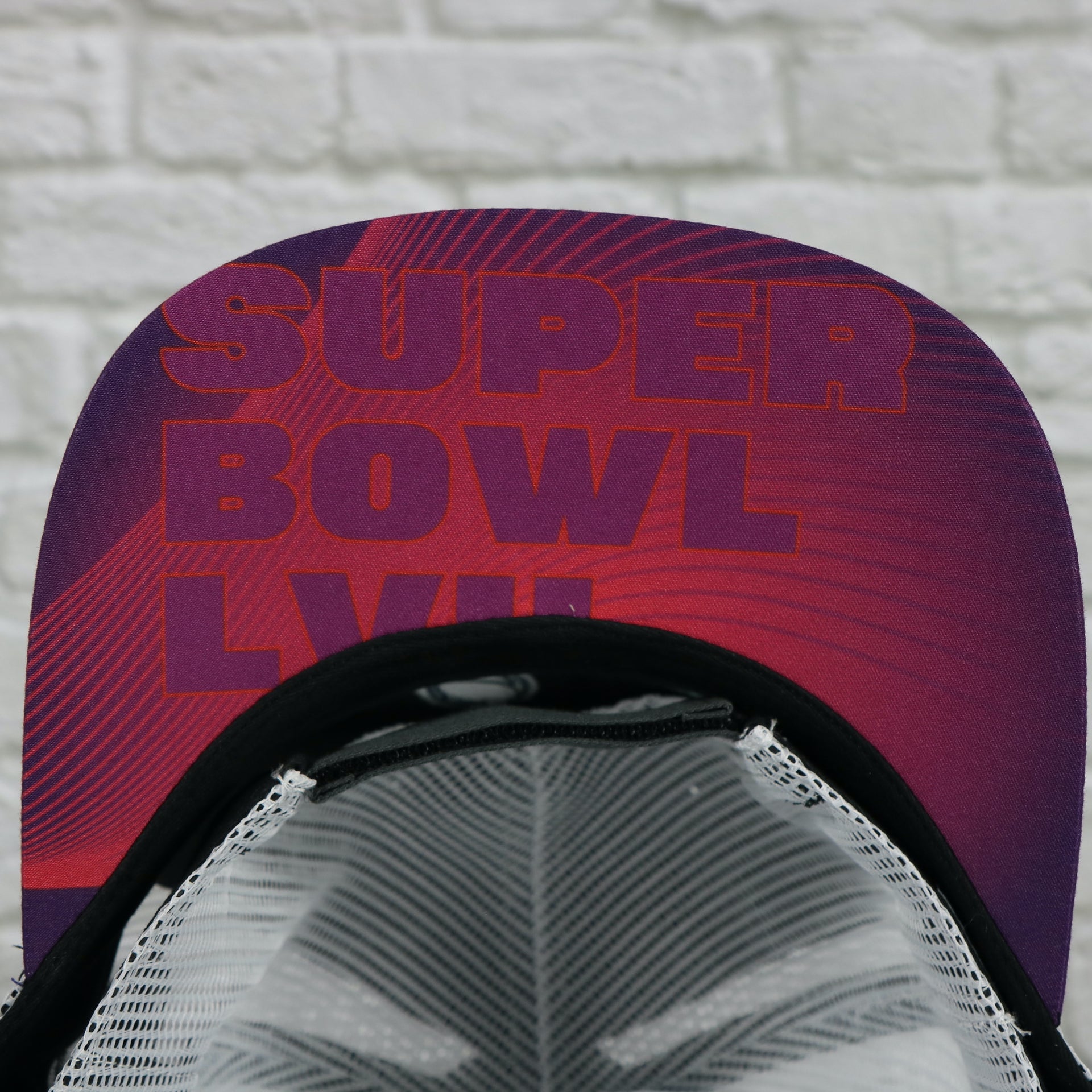 Super Bowl LVII under visor on the Philadelphia Eagles Super Bowl LVII (Super Bowl 57) Side Patch Charcoal/White Trucker Hat