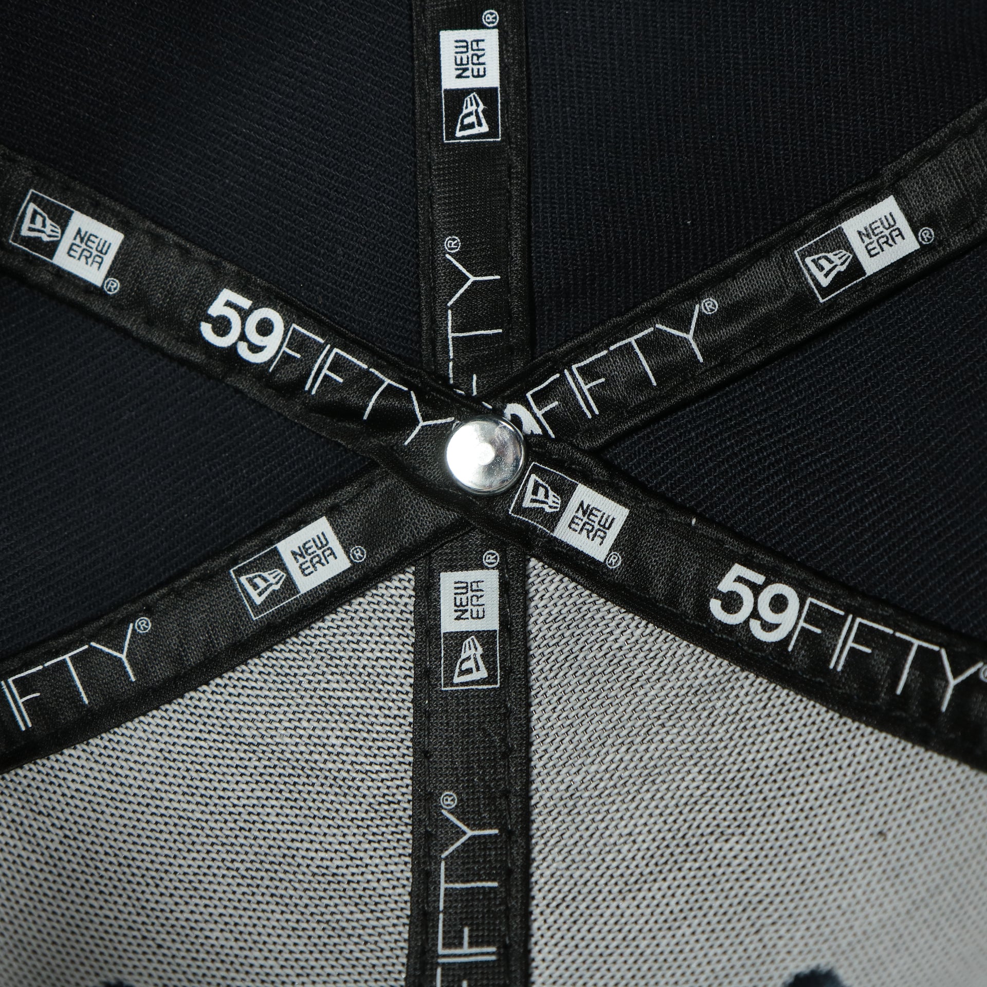 new era taping on the Atlanta Braves 40th Anniversary Side Patch Green Bottom Navy 59Fifty Fitted Cap | Botanical Pack