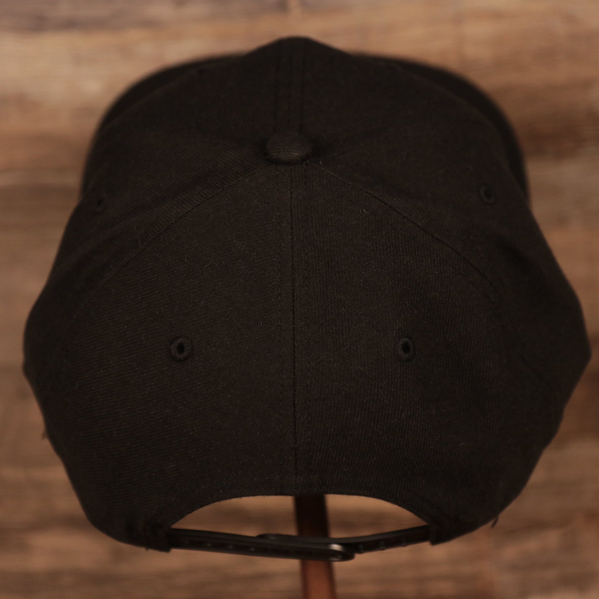 back of the Los Angeles Clippers Black Adjustable Grey Bottom Snapback Hat