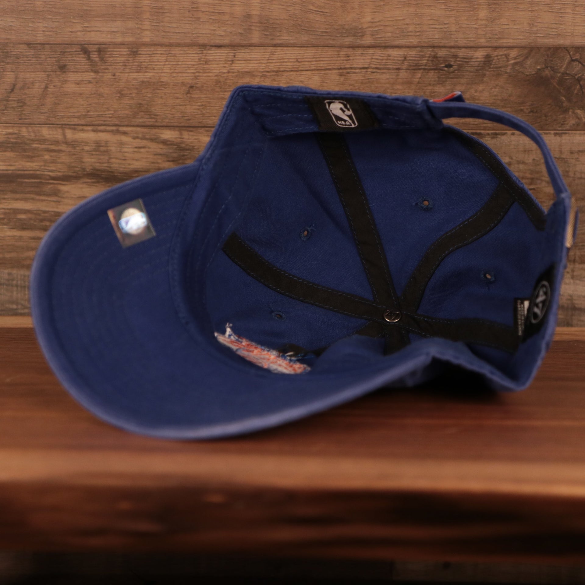 bottom of the New York Knicks Royal Blue Adjustable Dad Hat