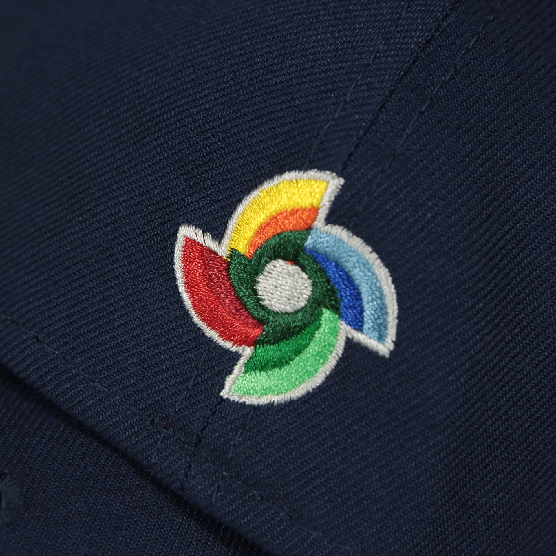 world baseball classic logo on the United States 2023 World Baseball Classic Grey Bottom Navy 59Fifty Fitted Cap