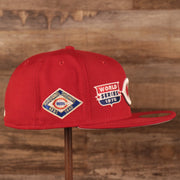 Wearer's right of the Cincinnati Reds All Over World Series Side Patch 5x Champ Gray Bottom 59Fifty Fitted Cap