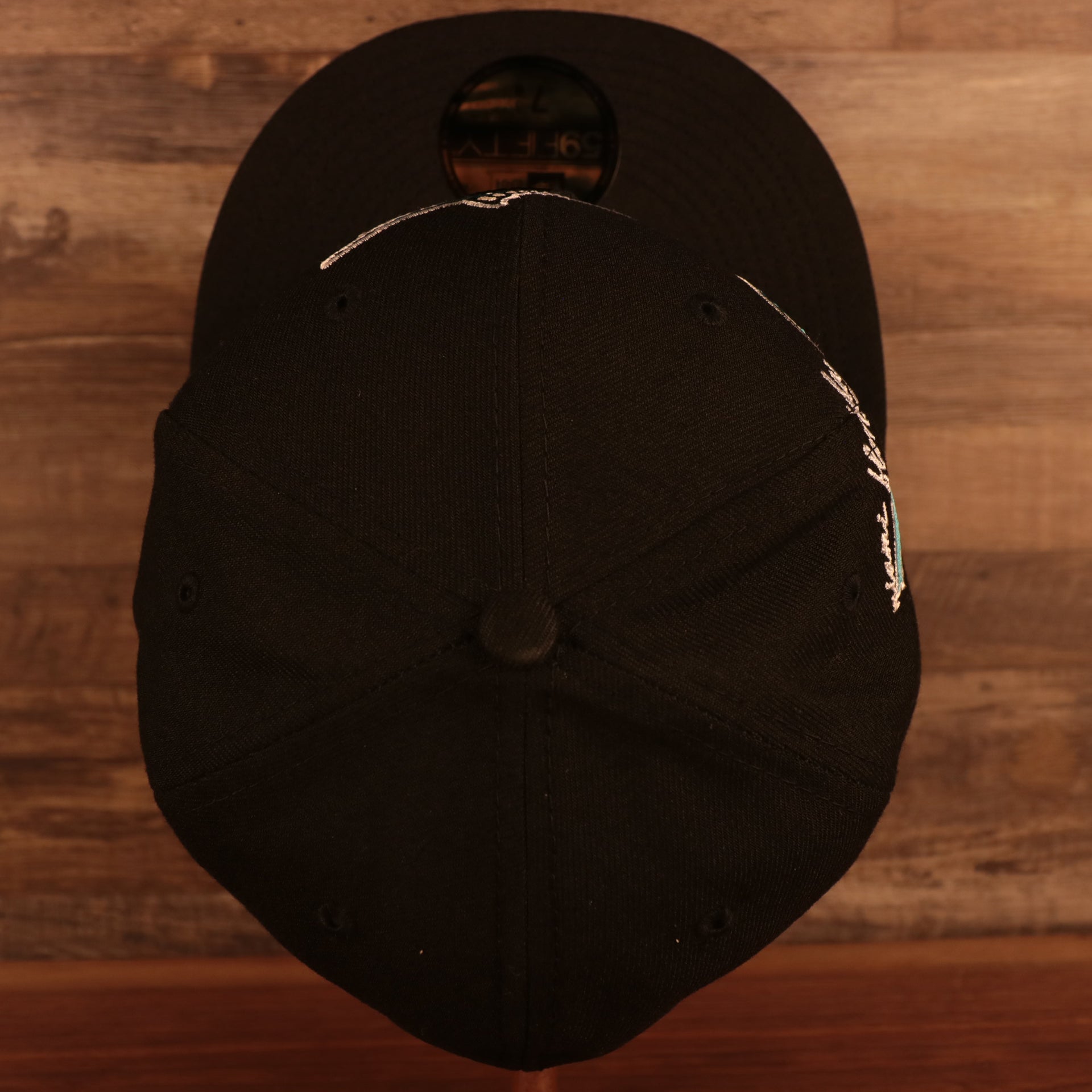 Top down view of the Florida Marlins Cooperstown "City Cluster" Side Patch Gray Bottom Black 59Fifty Fitted Cap