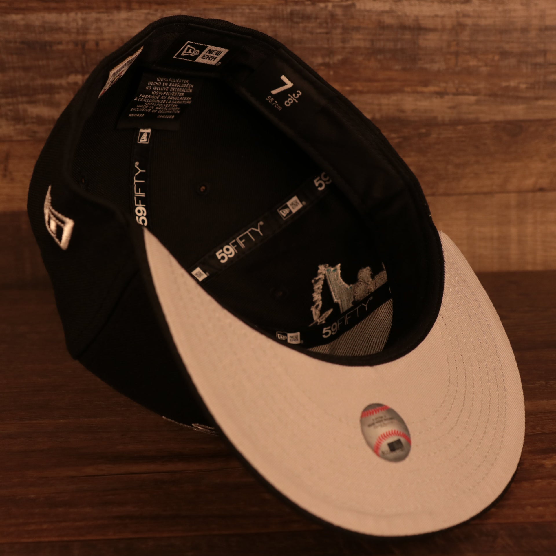 Gray bottom of the Florida Marlins Cooperstown "City Cluster" Side Patch Gray Bottom Black 59Fifty Fitted Cap