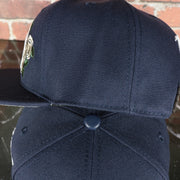 leather button on the New York Yankees All Over Roses Patch Grey Bottom | Midnight Navy Wool Snapback Hat