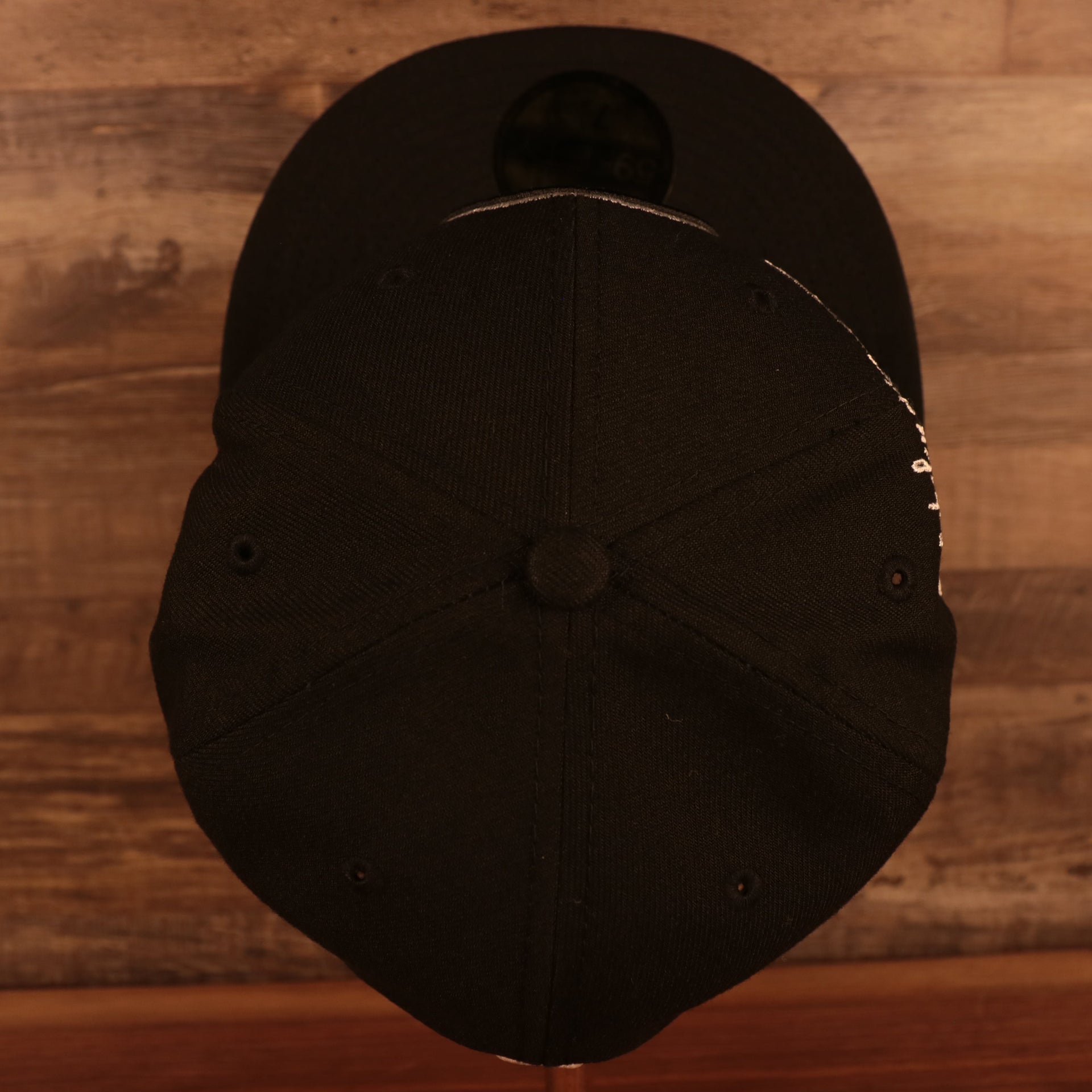 Top down view of the Brooklyn Nets "City Cluster" Side Patch Gray Bottom Black 59Fifty Fitted Cap