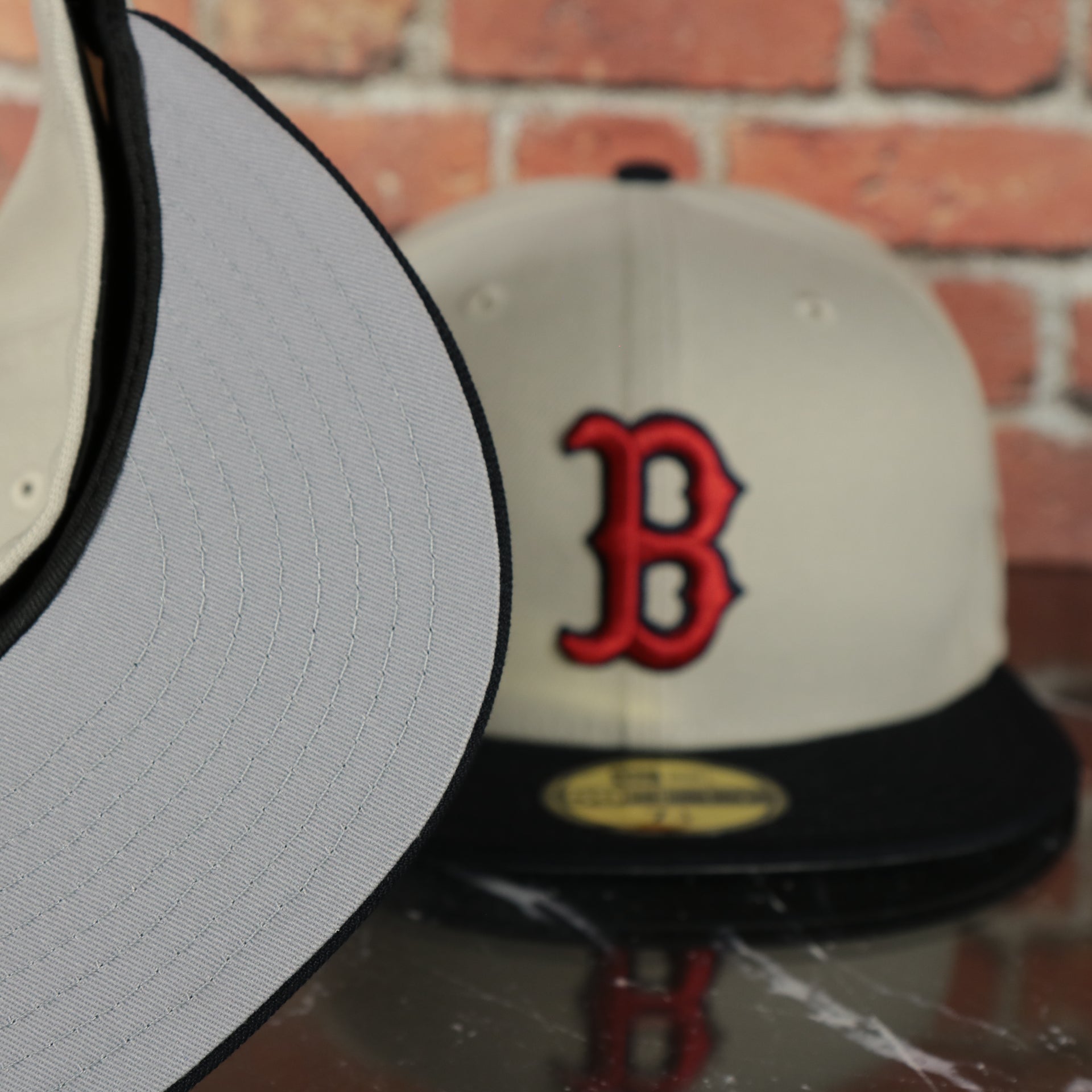grey under visor on the Boston Red Sox World Class 9-Time World Series Champions Two Tone Grey Bottom | Sand/Navy 59Fifty Fitted Cap