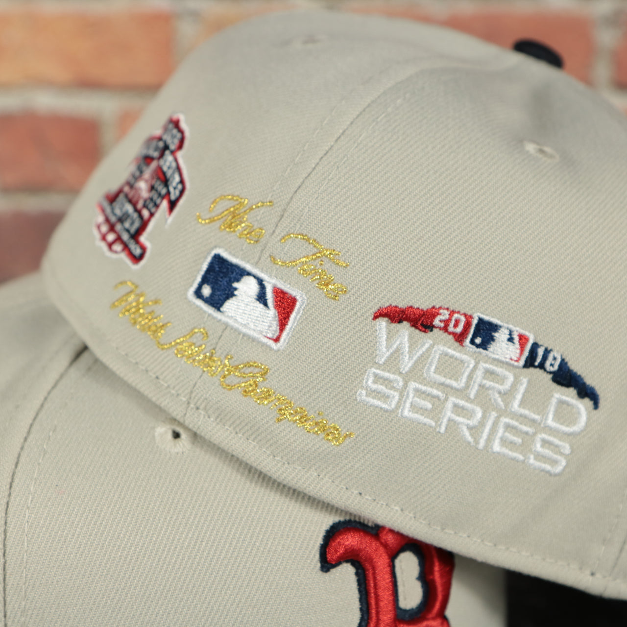 back side of the Boston Red Sox World Class 9-Time World Series Champions Two Tone Grey Bottom | Sand/Navy 59Fifty Fitted Cap