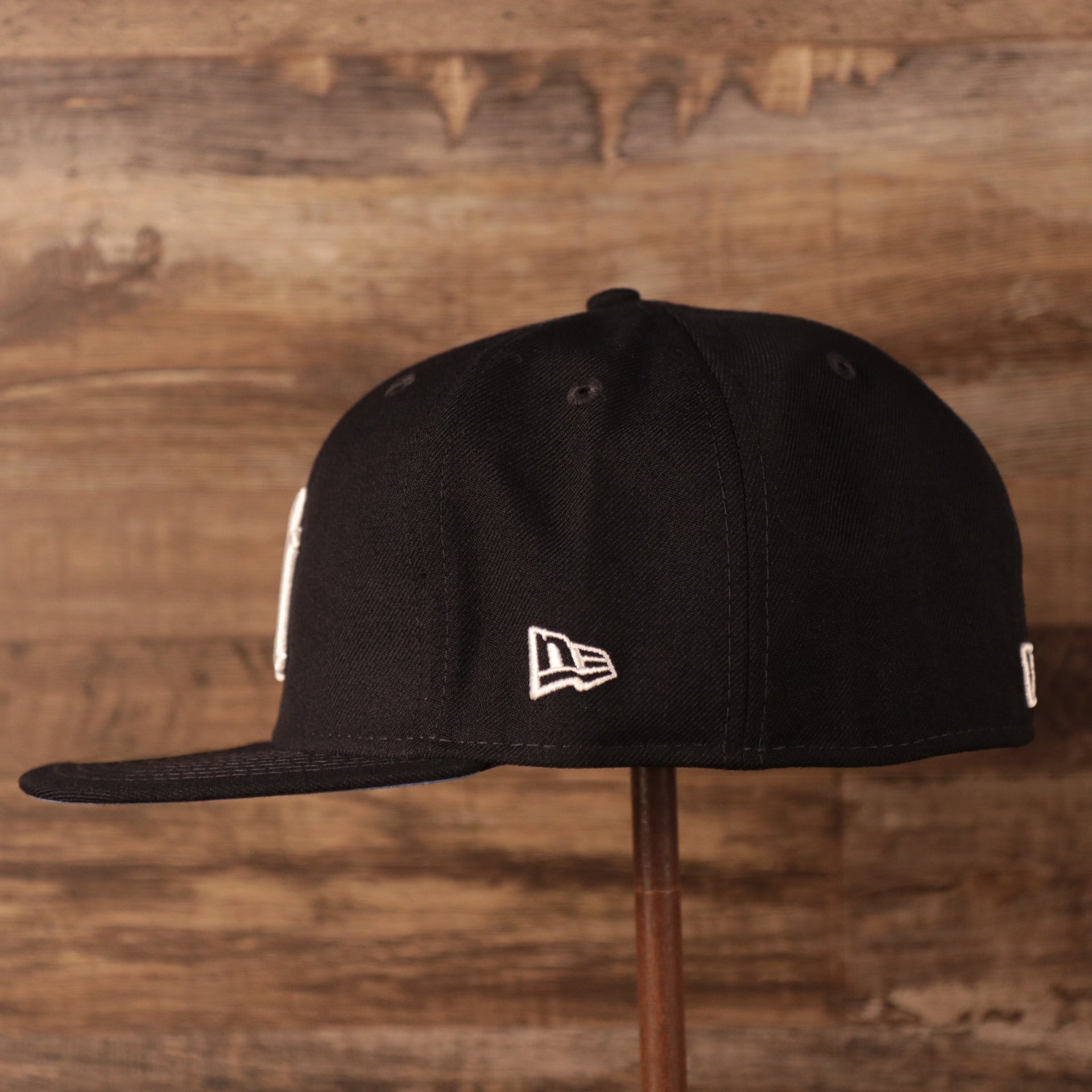 Wearer's left of the New York Yankees 2008 All Star Game Crystal Side Patch Icy Blue Bottom 59Fifty Fitted Cap