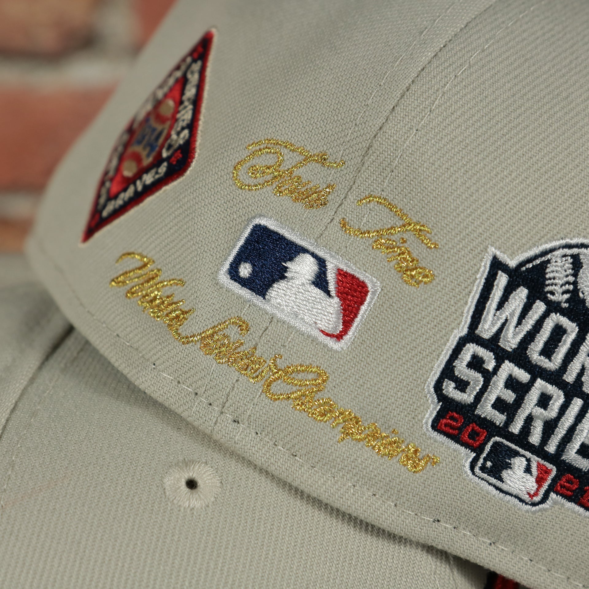 4 time world series champion script Atlanta Braves World Class 4-Time World Series Champions Two Tone Grey Bottom | Sand/Navy 59Fifty Fitted Cap