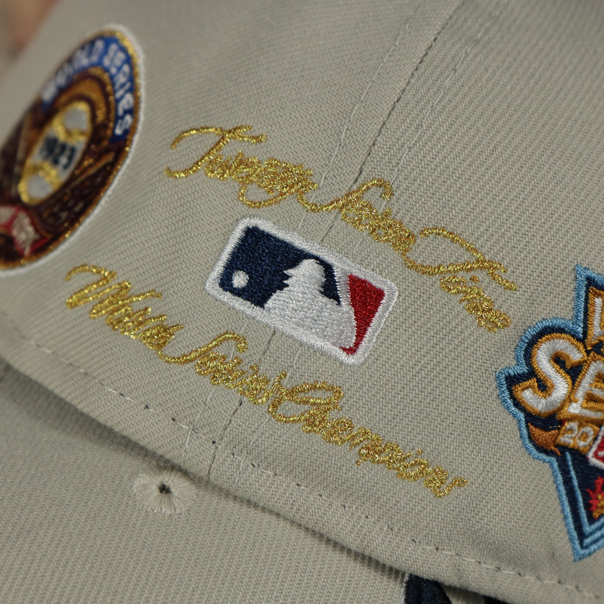 27 time world champion script on the New York Yankees World Class 27-Time World Series Champions Two Tone Grey Bottom | Sand/Navy 59Fifty Fitted Cap