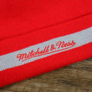 The Mitchell And Ness Script Logo on the Houston Rockets Vintage Red & Gray Beanie OSFM