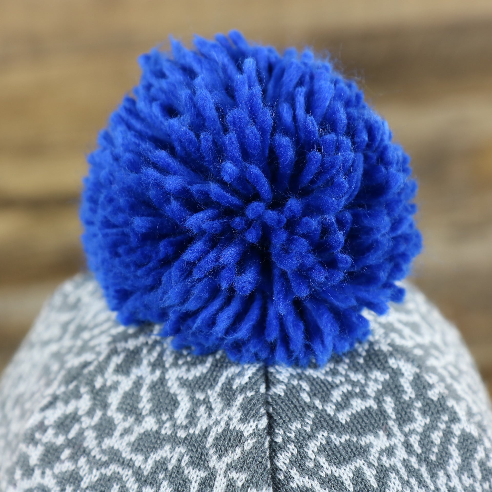 The Pom Pom on the New York Knicks Jordan 3 Matching Concrete Print Winter Beanie With Pom Pom | Gray Winter Beanie