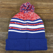 The backside of the Kid’s New York Giants Striped Pom Pom Winter Beanie | Royal Blue, Red, And White Beanie