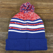The backside of the Kid’s New York Giants Striped Pom Pom Winter Beanie | Royal Blue, Red, And White Beanie