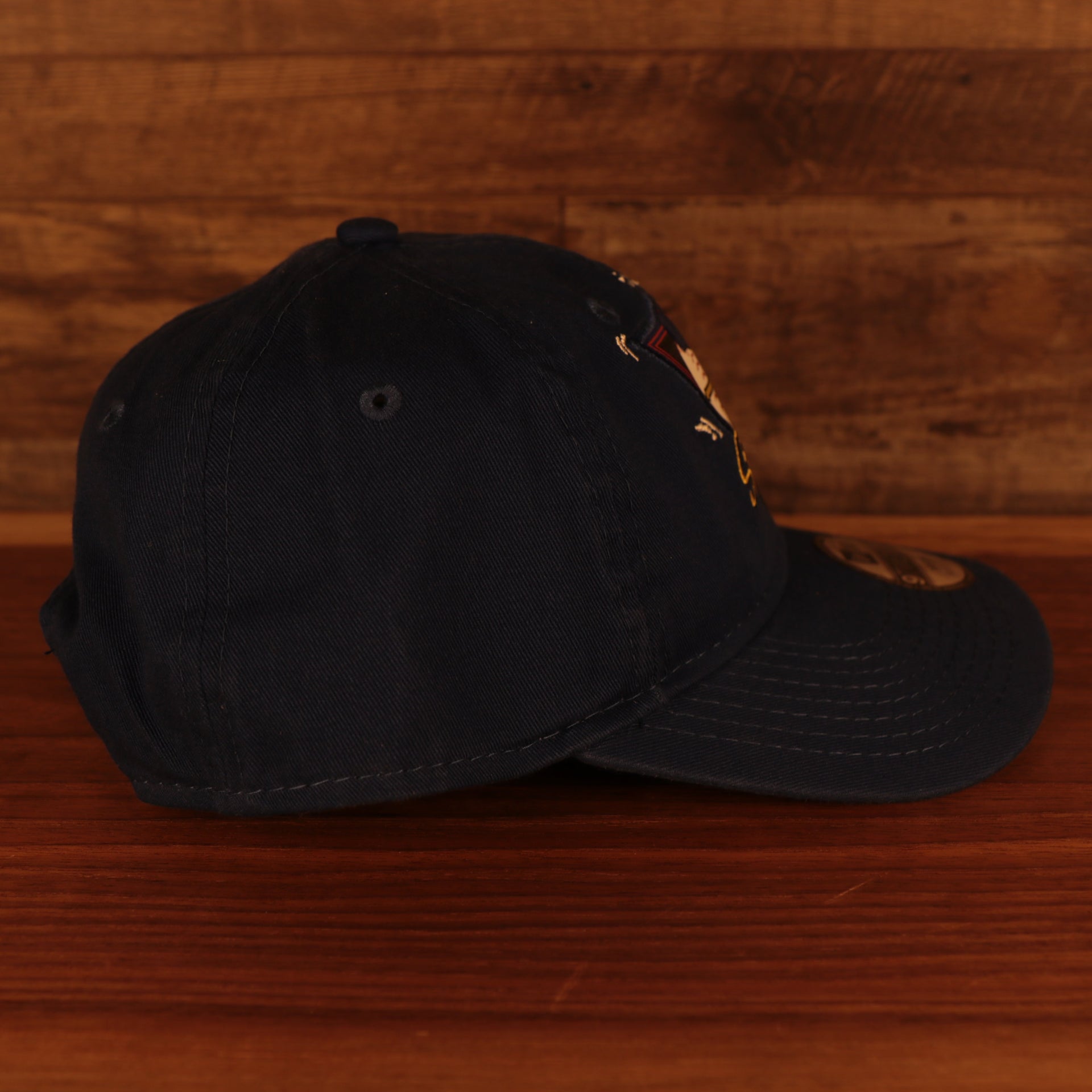 wearers right side of the New York Mets Spring Training 2022 Mr. Met Retro On Field Blue Youth 9Forty Dad Hat
