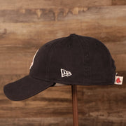wearers right side of the Boston Red Sox Navy Blue 9Twenty Adjustable Dad Hat