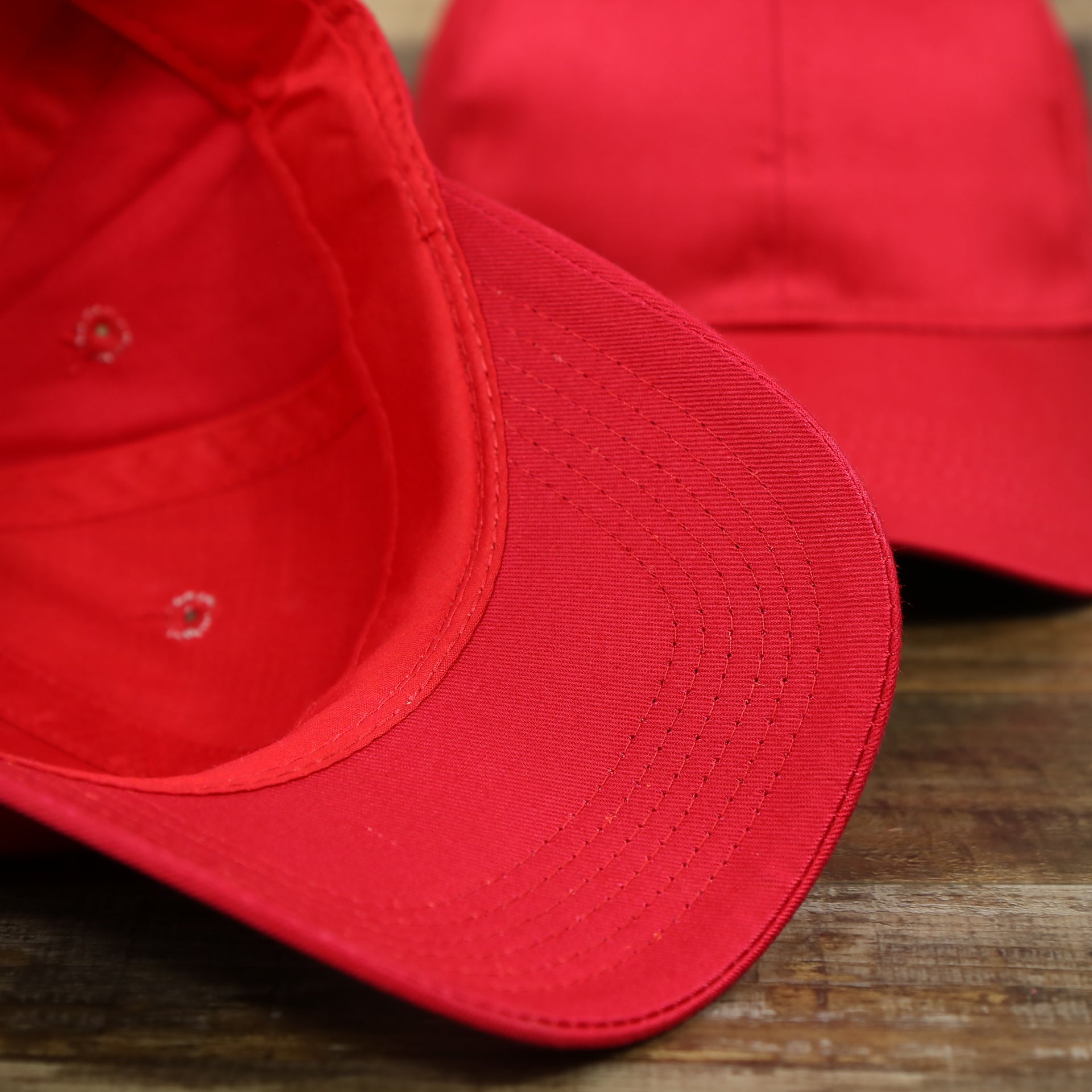 The undervisor on the Youth Cardinal Red Flat Brim Blank Baseball Hat | Kid’s Red Dad Hat