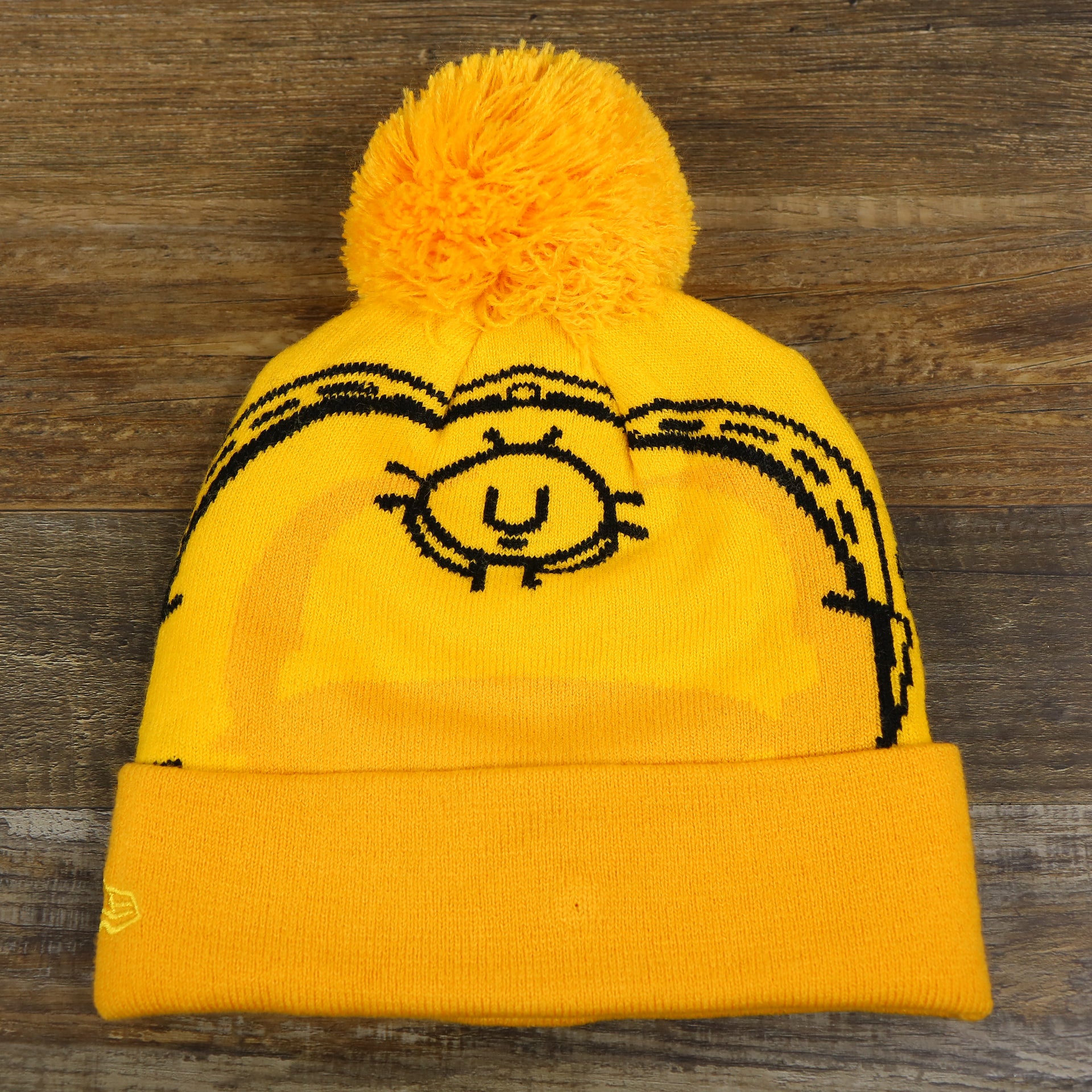 The backside of the C3PO Rebel Alliance Cuffed Logo Winter Beanie With Pom Pom | Yellow Winter Beanie